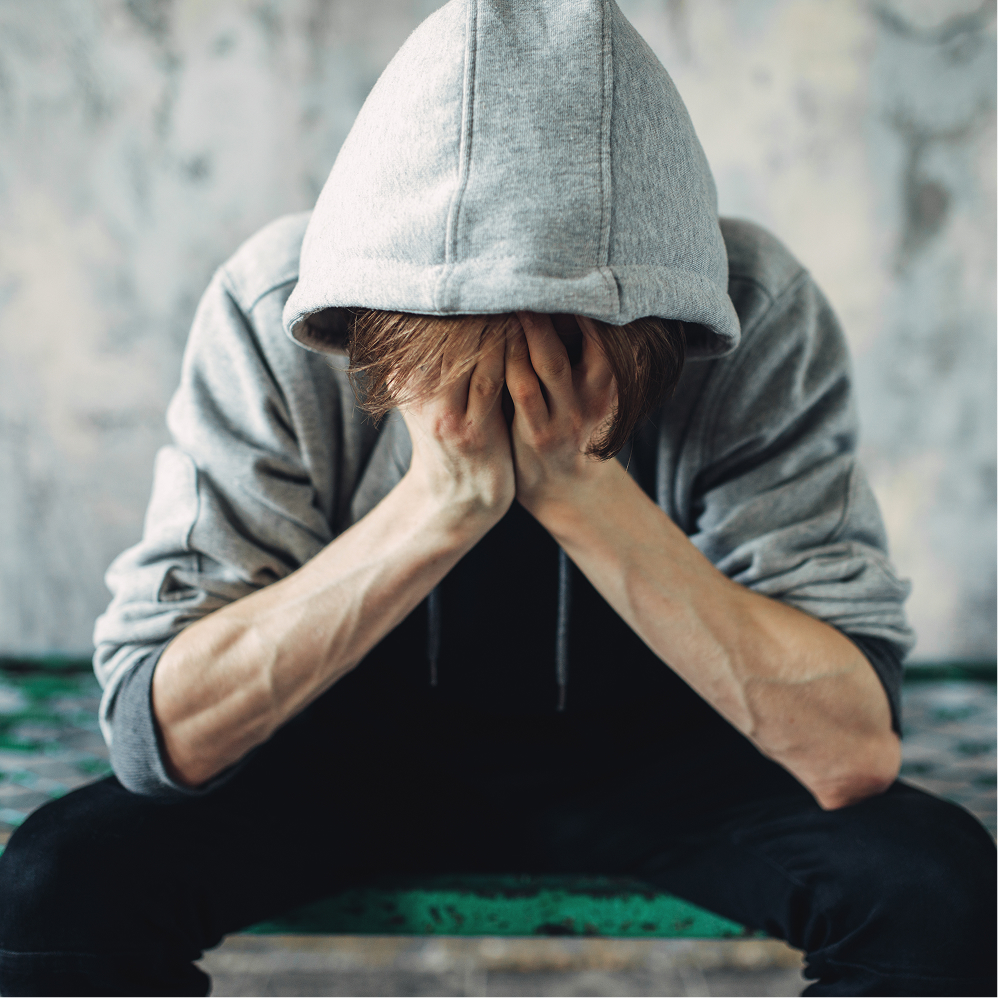Person with head in palms