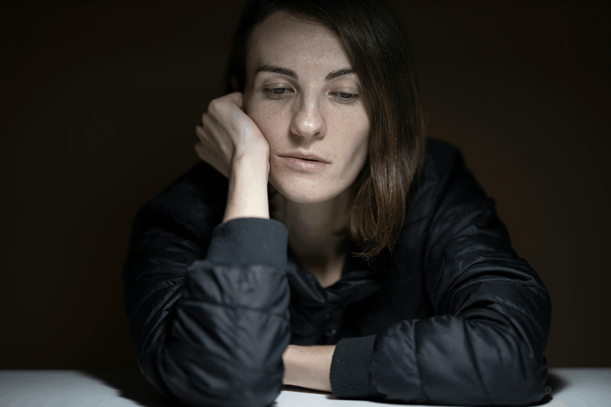 woman looking sad